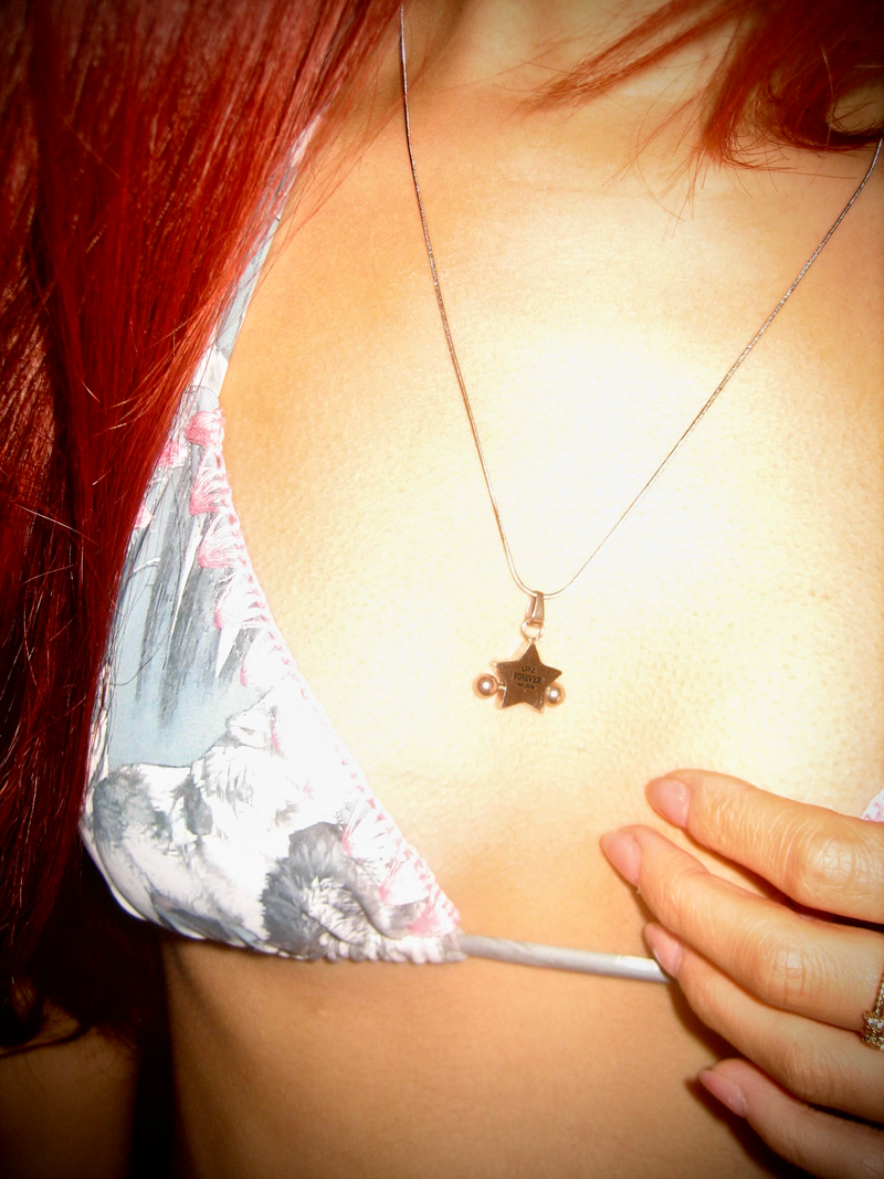PIERCED STAR NECKLACE