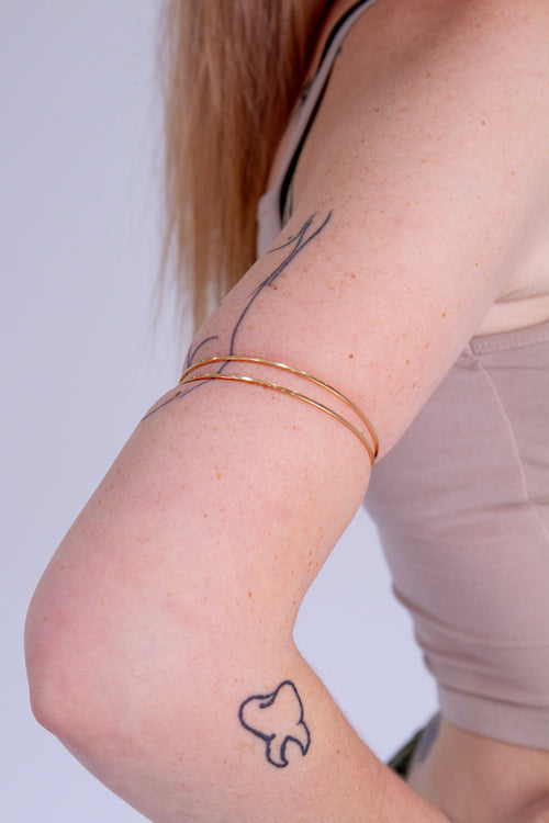 DOUBLE ARM BAND